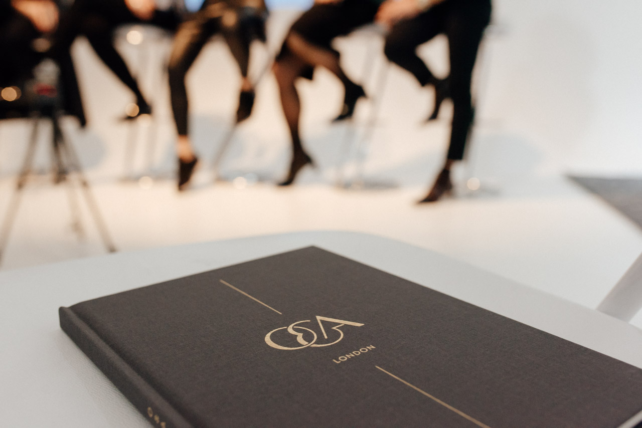 Open editorial book on warm paper